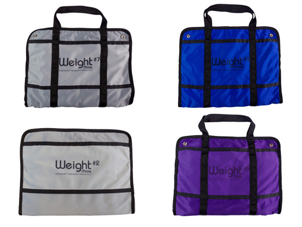 Weighted sensory pads in 3 different colors; grey, blue, and purple.