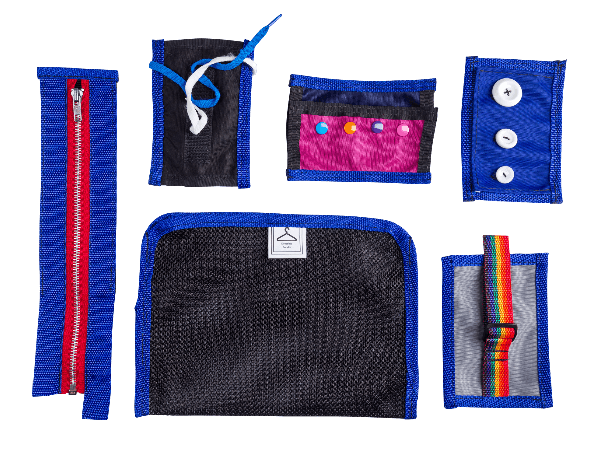 Collection of various fabric pouches and accessories on a black background