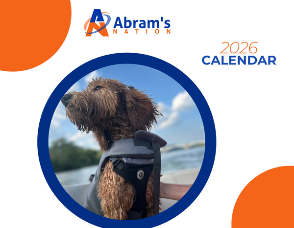 2026 calendar cover with a dog on a boat and Abram's Nation logo