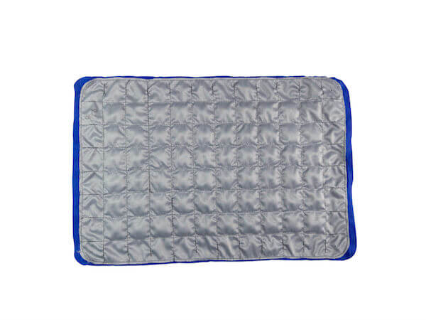 Deconstructed insides of the Weight Mate showing a grid of squares containing weighted beads.